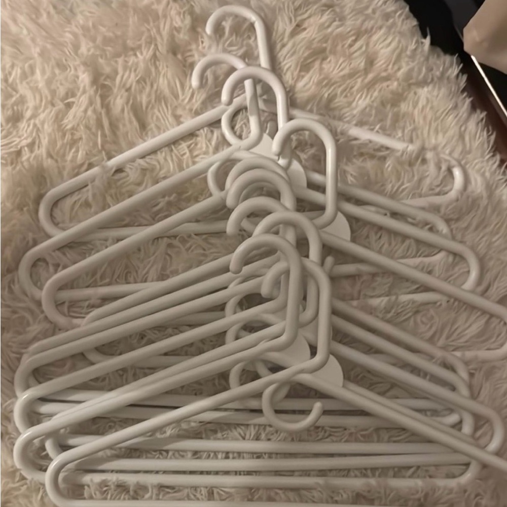 Set of White Plastic Hangers